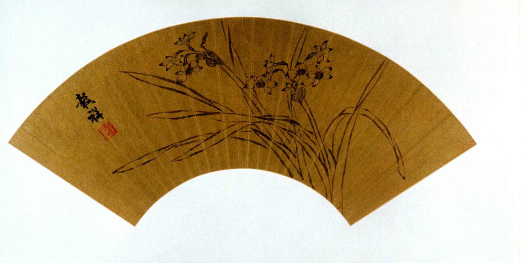 A work made of folding fan mounted as an album leaf; ink on gold paper.