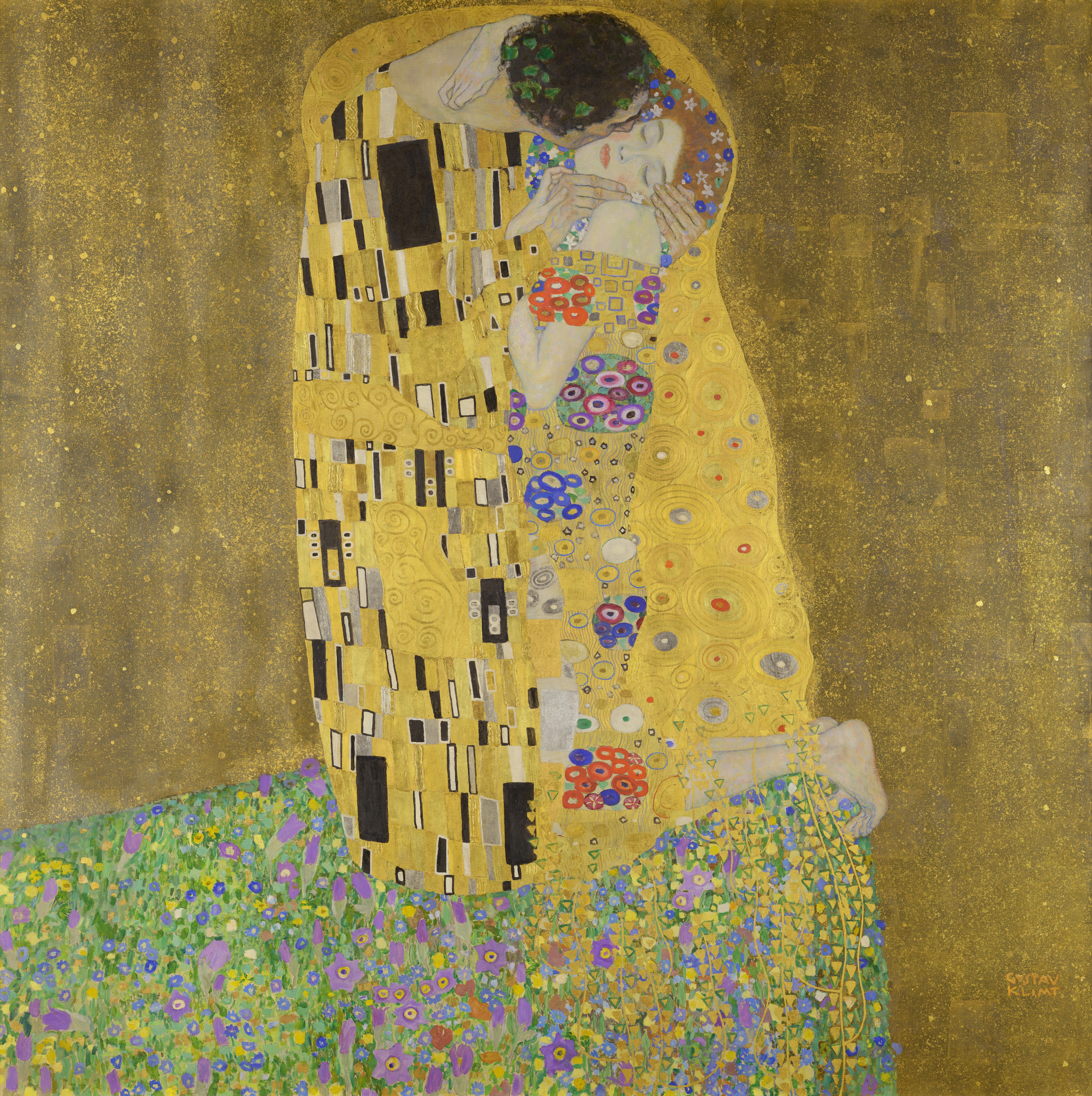 Klimt: an embracing couple within a gold field covered with geometric and floral patterns.