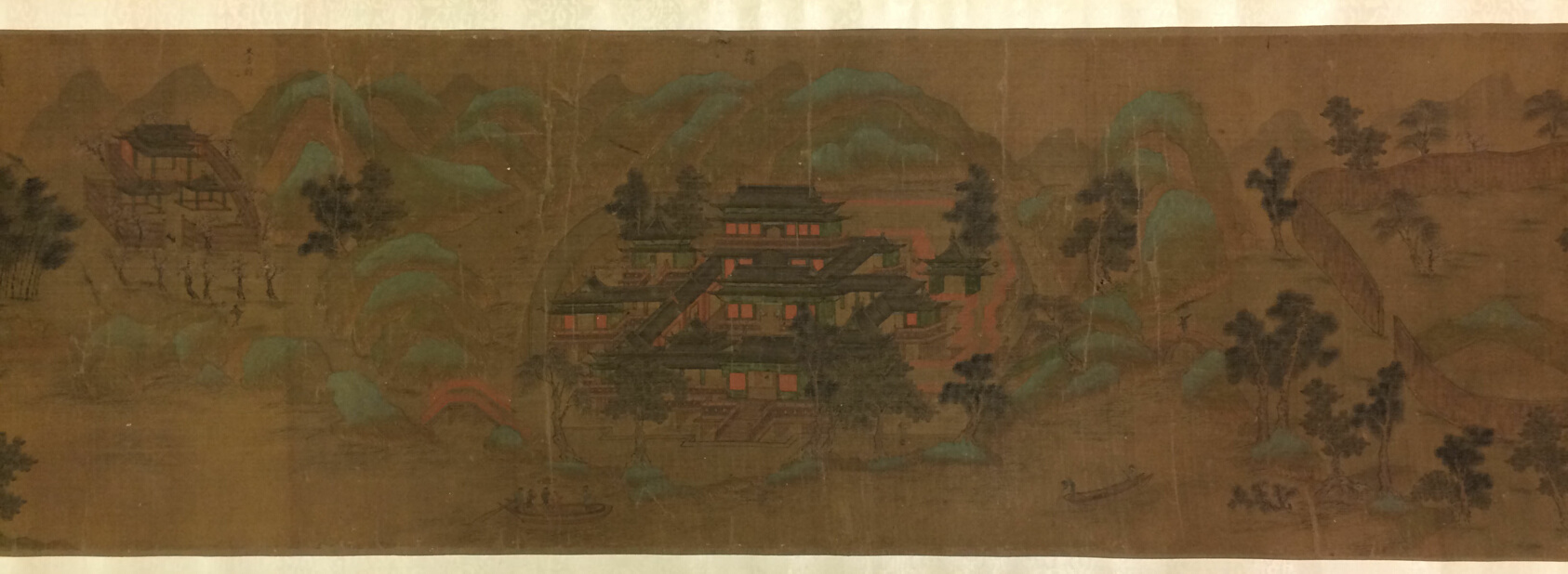 A work made of handscroll; ink, color, and gold on silk.
