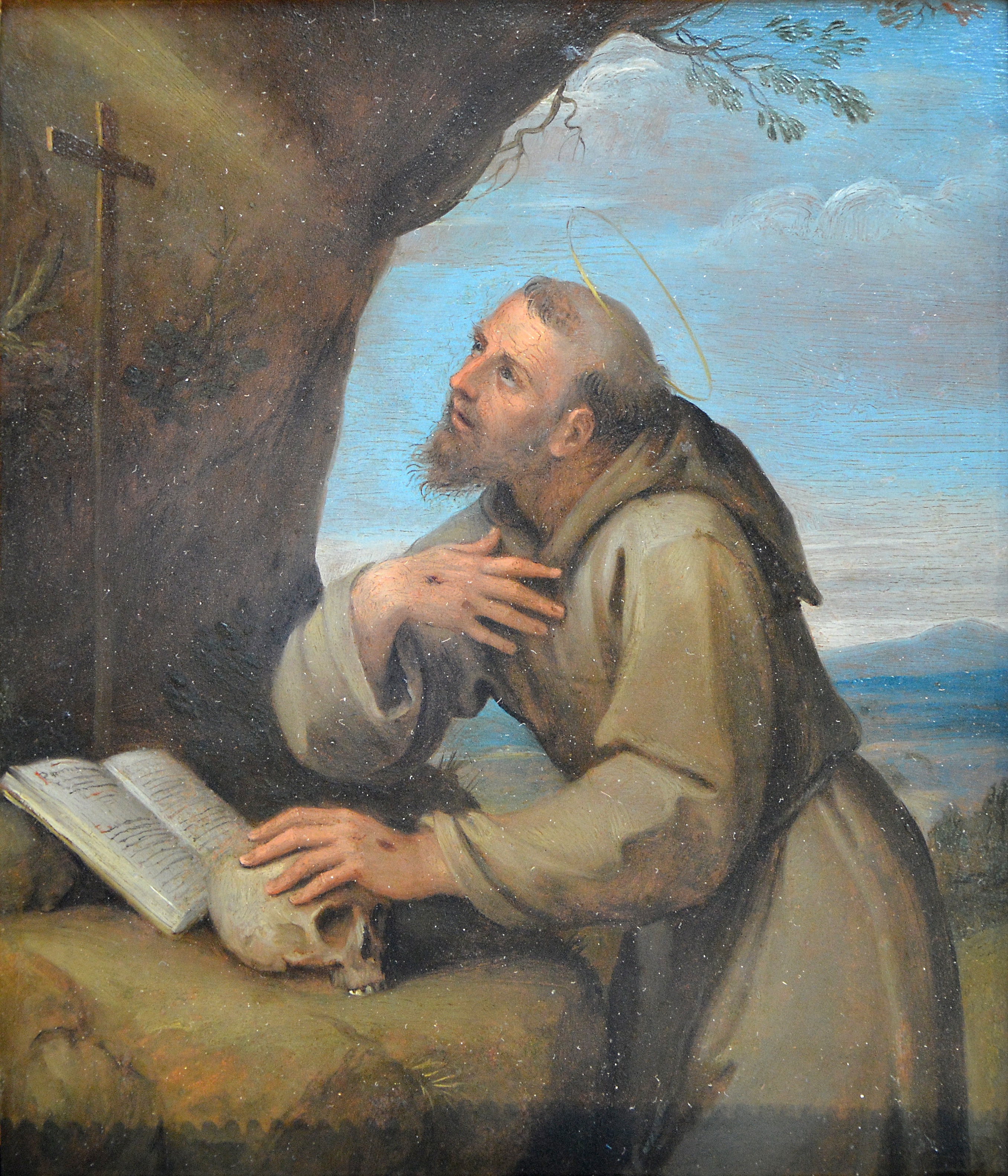 Saint François d'Assise en oraison devant un crucifix by Francesco Albani