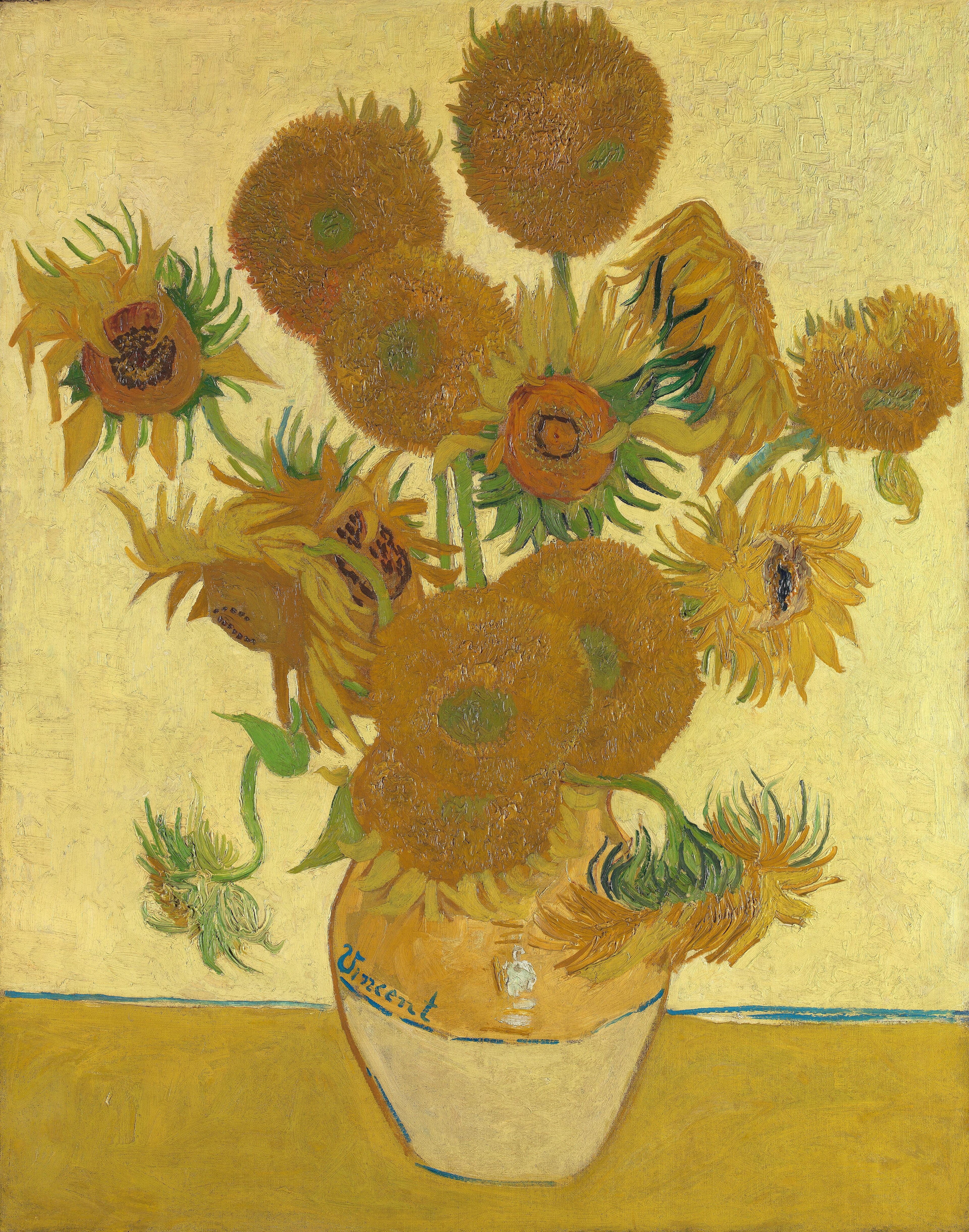 Van Gogh: yellow sunflowers with varied flower heads arranged in a vase on a table.