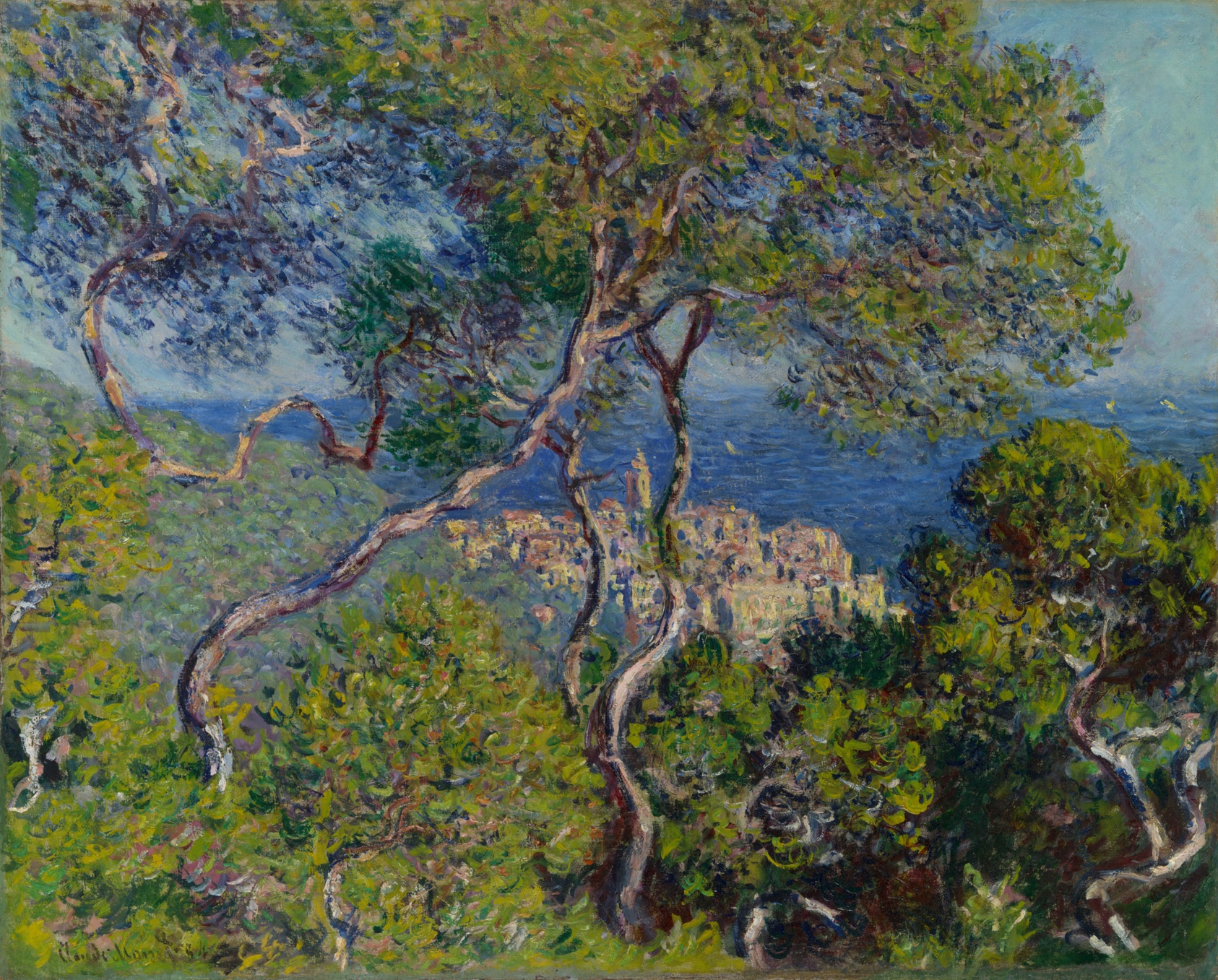 Bright landscape painting featuring spindly trees with lush leaves surrounded by light-green foliage, a small town visible between the trees at center, and a calm blue sea in the background.